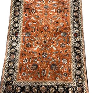 Traditional Orange and Black Floral Carpet
